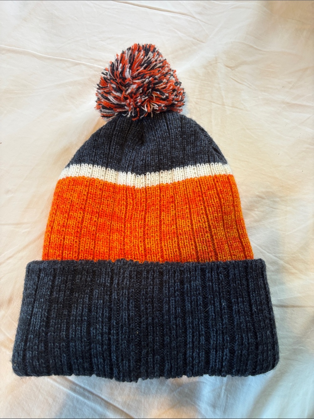 47 Kids Pom Beanie in Navy, Orange and White with Team Patch - Picture 4 of 4